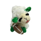 Plush toy resembling a sheep holding a football on a white background