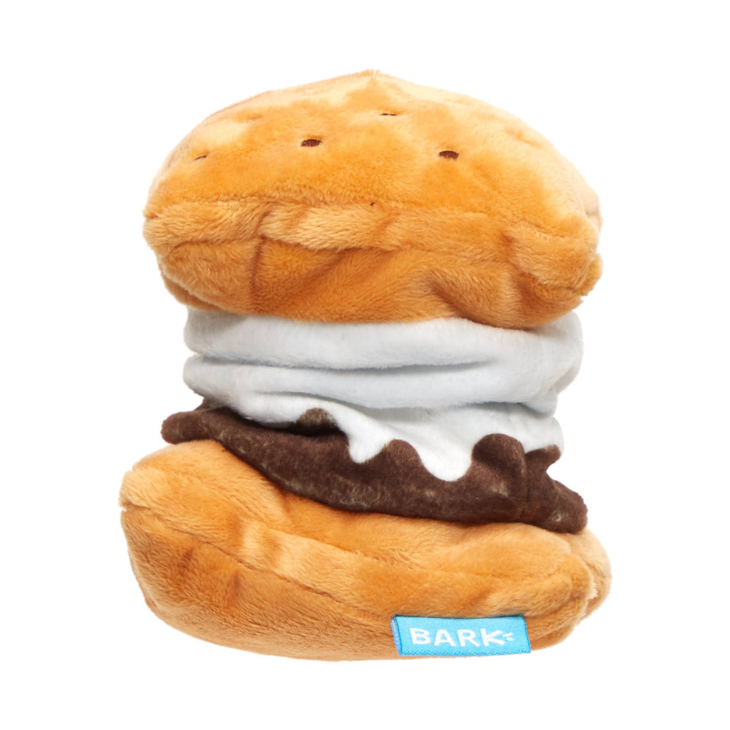 BARK More S’mores plush dog toy with golden graham cracker layers, white marshmallow filling, and a brown chocolate layer.